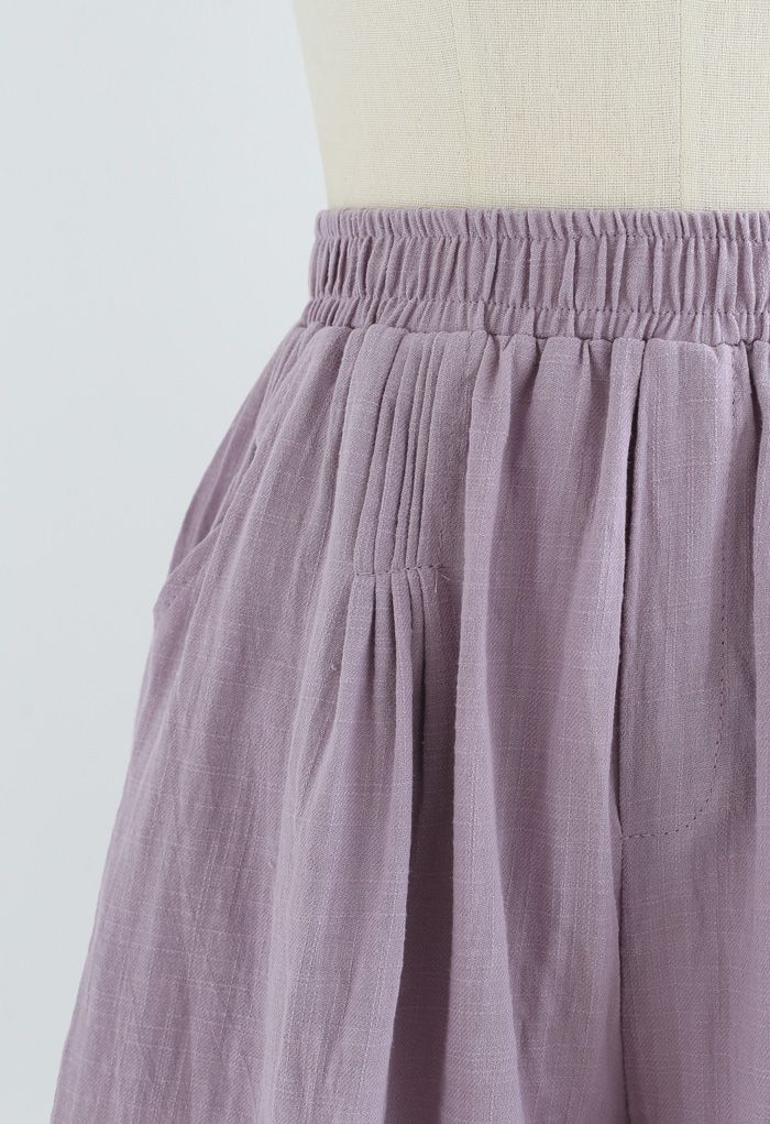 Pantalones cortos de algodón con bolsillos delanteros Pintuck en morado