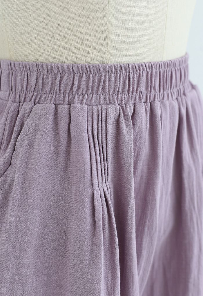 Pantalones cortos de algodón con bolsillos delanteros Pintuck en morado