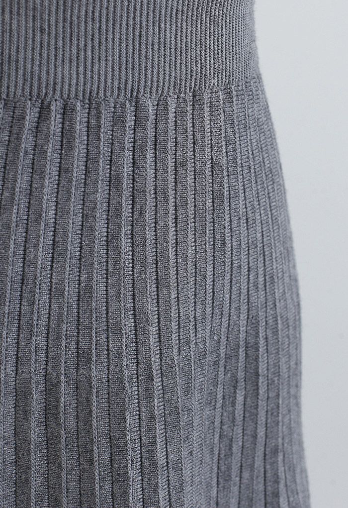 Falda midi de punto plisada con ribete de encaje en gris