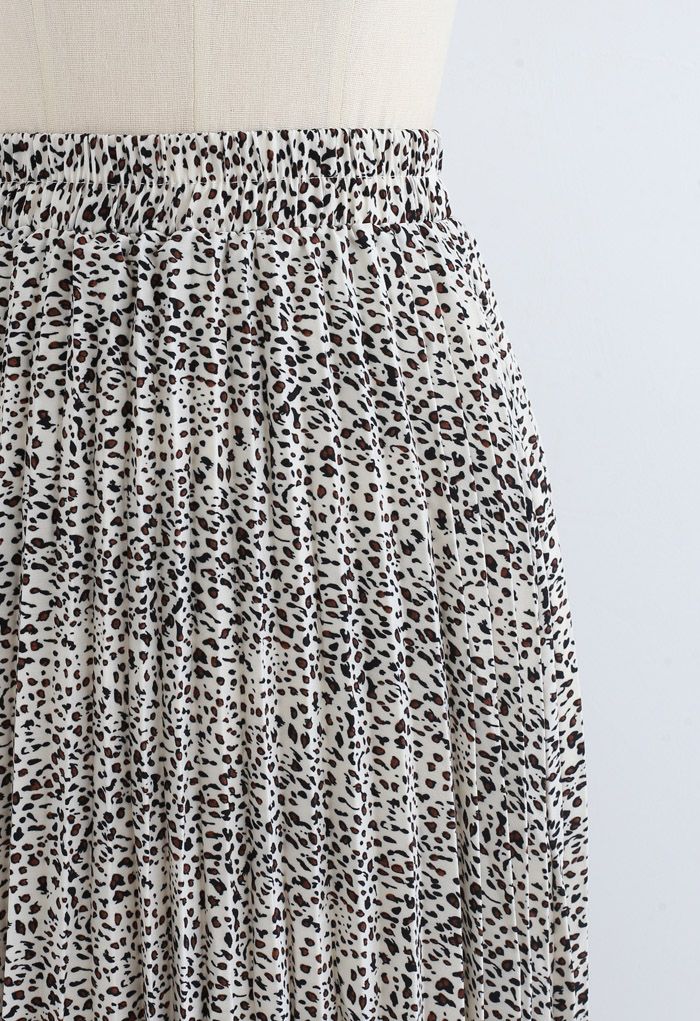 Falda midi plisada animal print en marfil