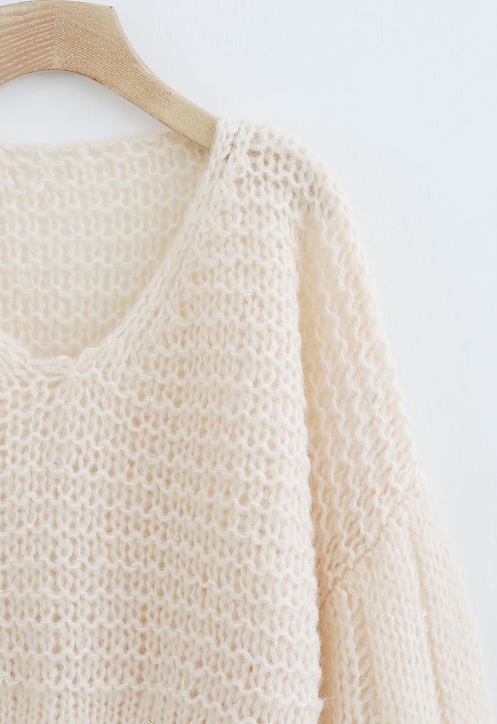 Suéter corto calado de punto esponjoso en marfil