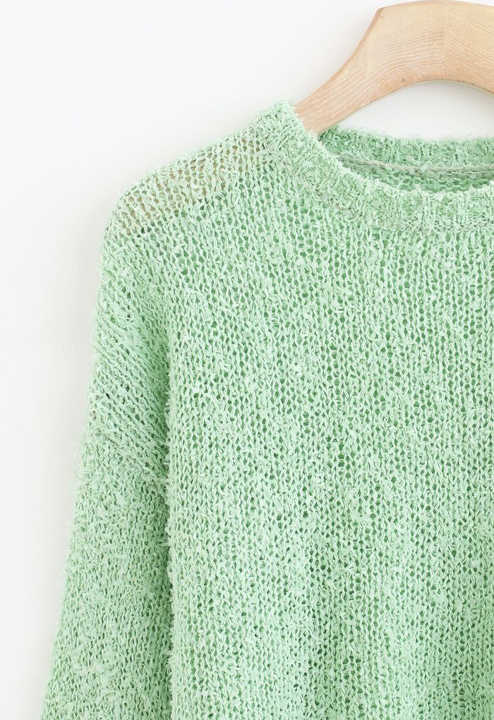 Suéter de punto calado esponjoso recortado en verde guisante