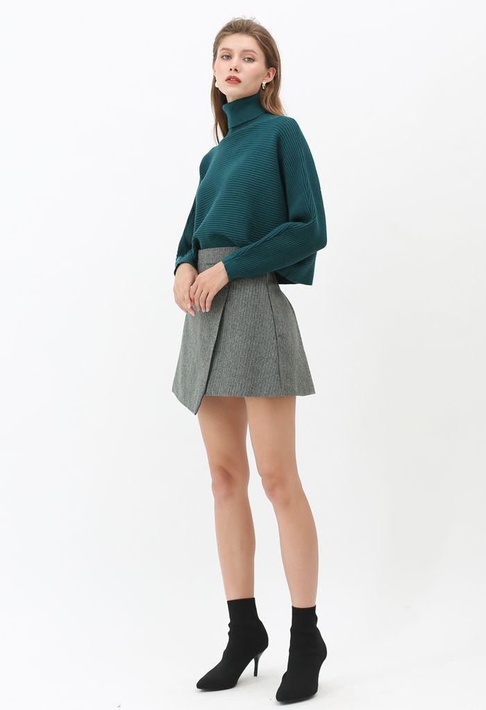 Minifalda de mezcla de lana con solapa de botones en verde oscuro
