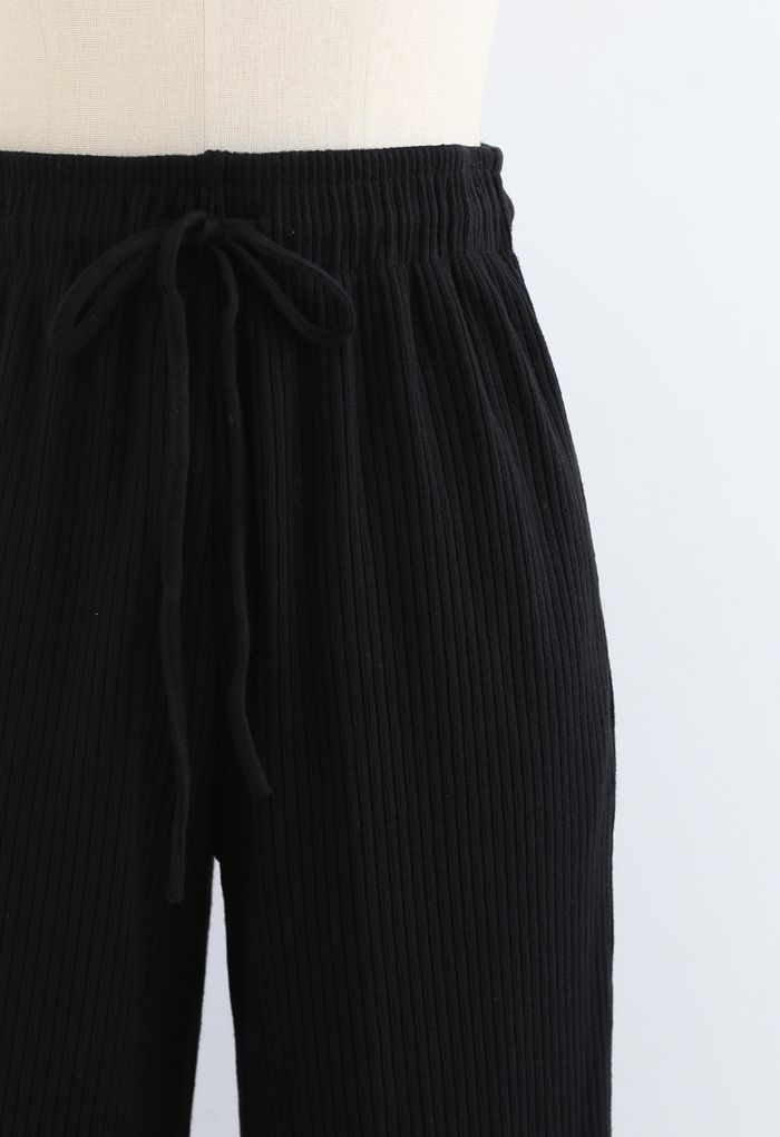 Pantalones cortos de punto de pernera ancha con cordón en negro