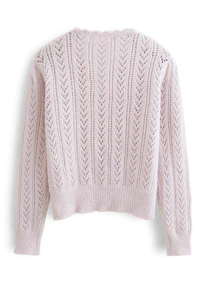 Suéter de punto suave al tacto con cuello en V ahuecado en rosa claro