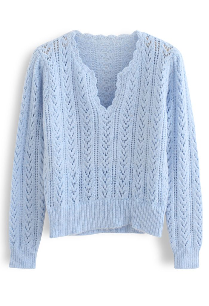 Suéter de punto suave al tacto con cuello en V ahuecado en azul