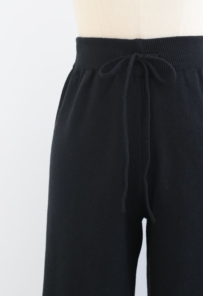 Pantalones de punto de pierna recta con cordón en la cintura en negro