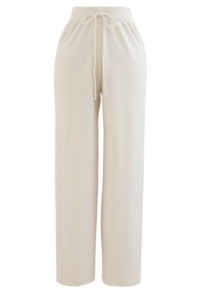 Pantalones de punto de pierna recta con cordón en la cintura en color crema