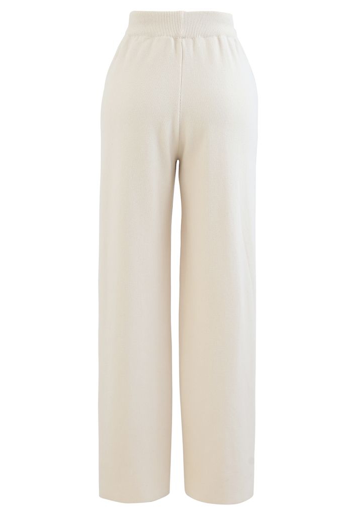 Pantalones de punto de pierna recta con cordón en la cintura en color crema
