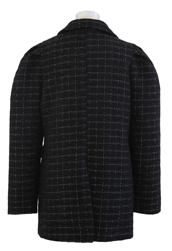 Abrigo de tweed con hombros abullonados y bolsillos en negro