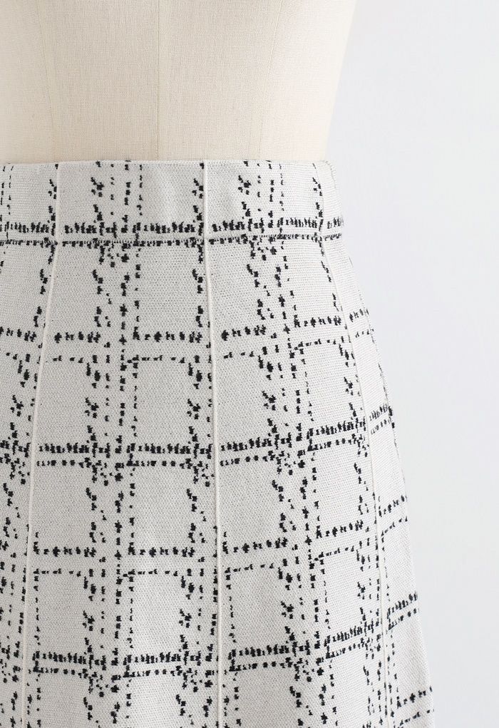 Falda de punto con dobladillo con flecos de rejilla en marfil
