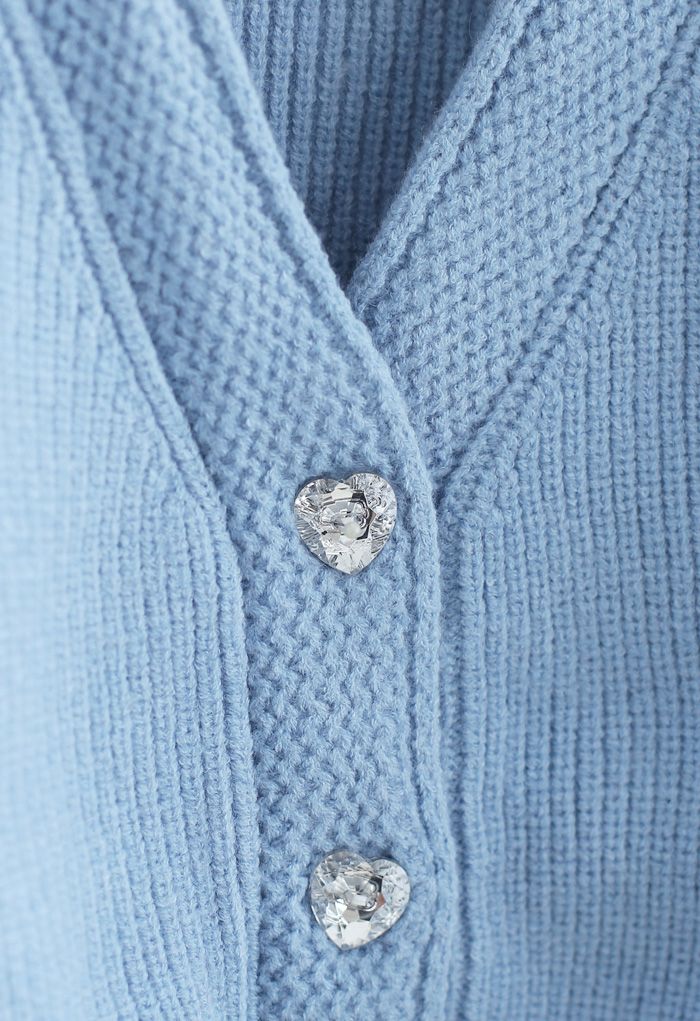 Cárdigan corto con mangas abullonadas y botones de cristal en azul