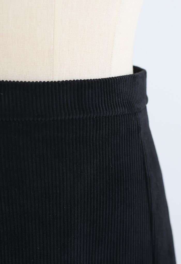 Falda midi de pana con abertura frontal en negro