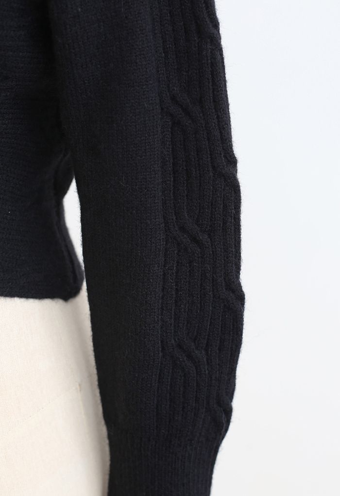 Suéter de punto acanalado entrecruzado en negro