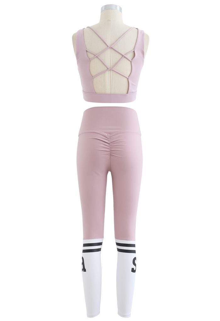 Conjunto de sujetador deportivo con cordones en la espalda y leggings levantadores de glúteos en rosa