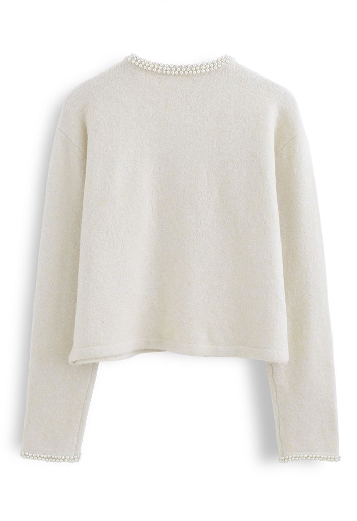 Suéter de punto esponjoso con cuello redondo nacarado brillante en crema