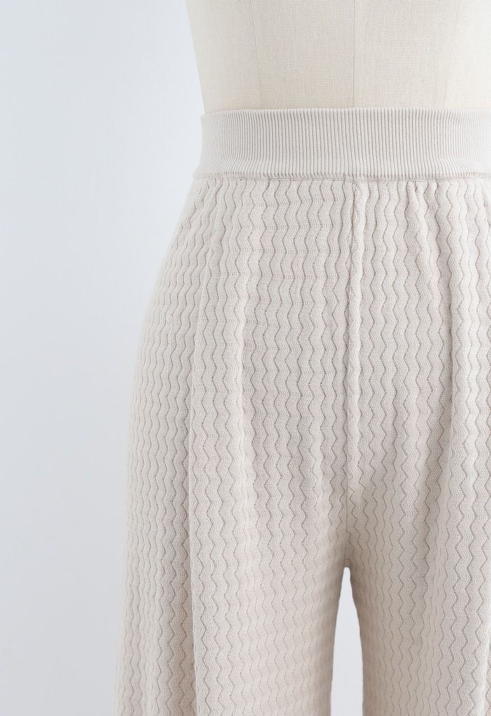 Pantalones de punto con textura ondulada en marfil