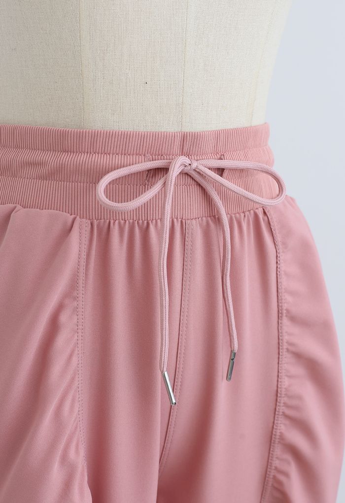 Joggers con detalle fruncido en la cintura con cordón en rosa polvoriento