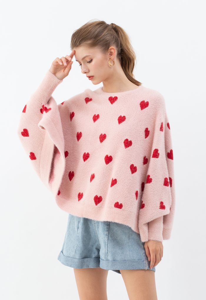 Suéter de punto esponjoso con corazón y mangas de murciélago en rosa