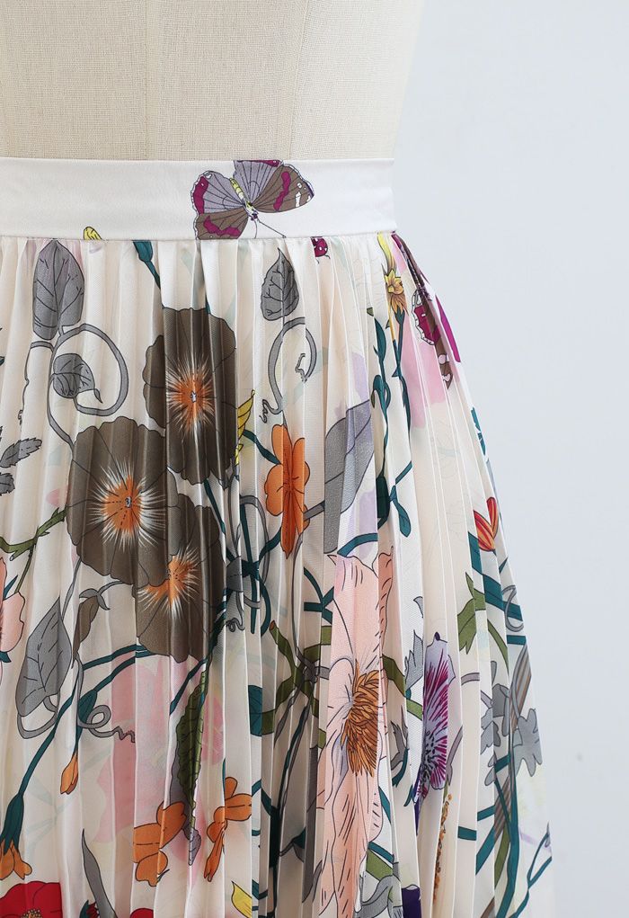 Falda midi plisada con estampado floral tropical