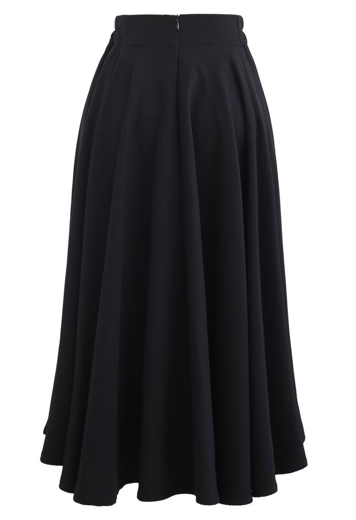 Falda midi acampanada con cintura elástica en color liso en negro