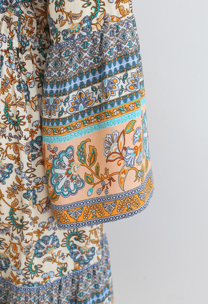 Mini vestido bohemio floral con cordón en la cintura y botón de concha