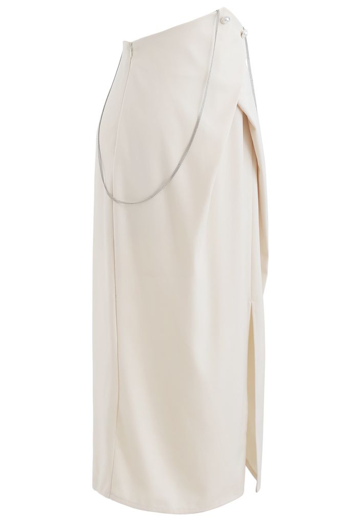 Falda lápiz dividida con ribete de perlas y cadena en color crema