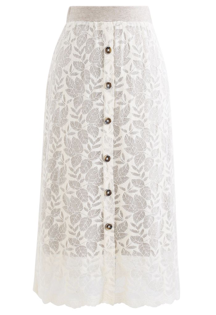 Falda midi de punto de encaje con botones y estampado de hojas en color crema