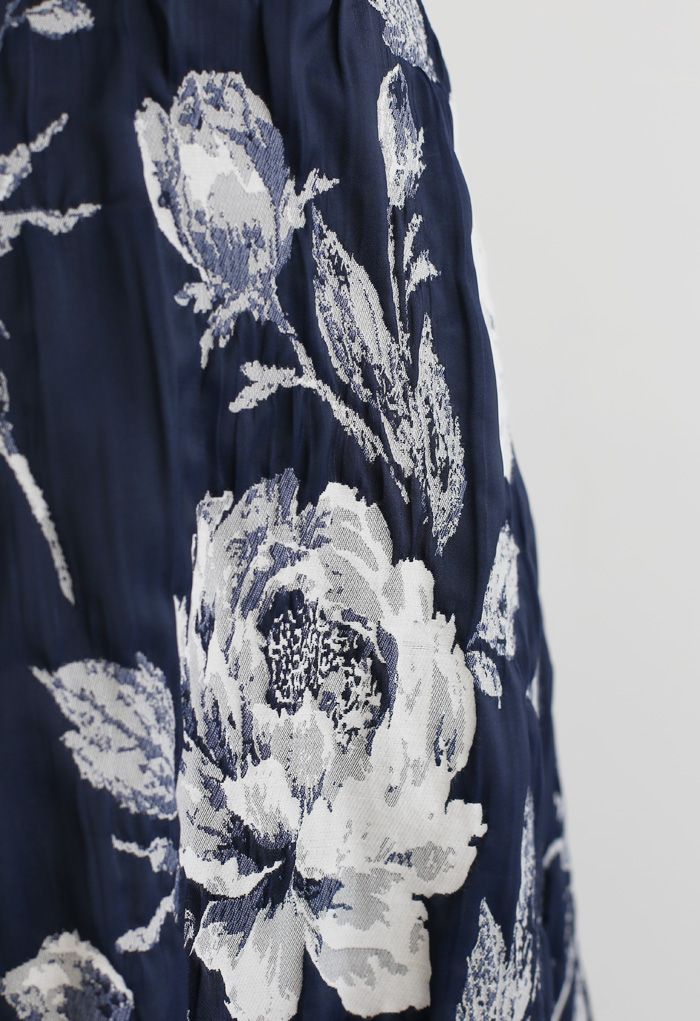 Falda midi plisada de jacquard floral azul marino