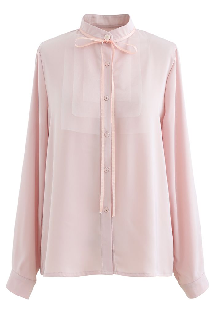 Camisa de satén con cuello de malla y lazo en rosa