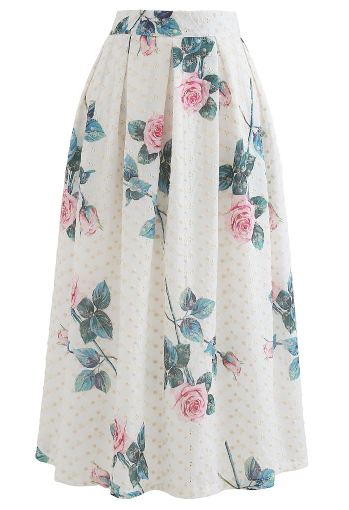Falda midi plisada bordada con ojales y estampado de rosas