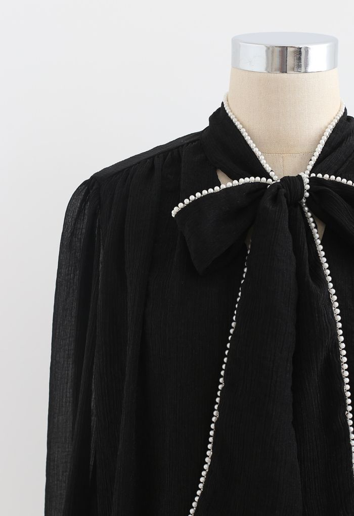 Camisa semitransparente con ribete de perlas Bowknot en negro