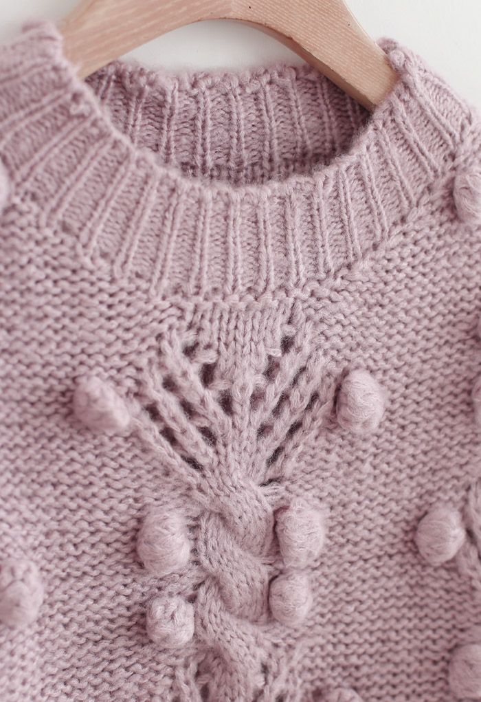 Suéter de punto con ojales y pompones de ochos en lila