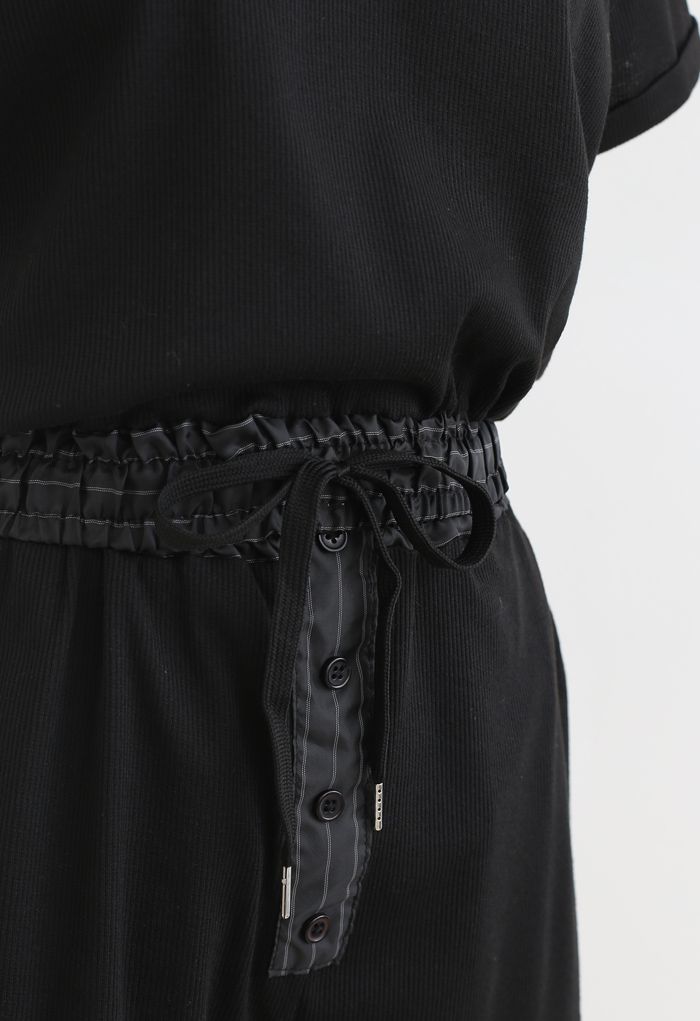 Conjunto de shorts y top corto con cordón y botones en negro