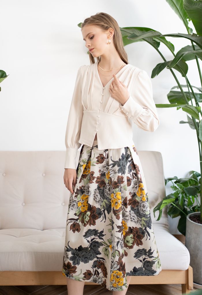 Falda midi plisada con estampado floral retro