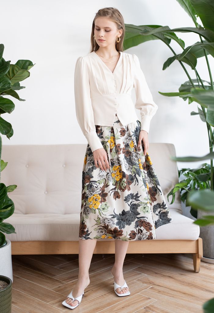 Falda midi plisada con estampado floral retro