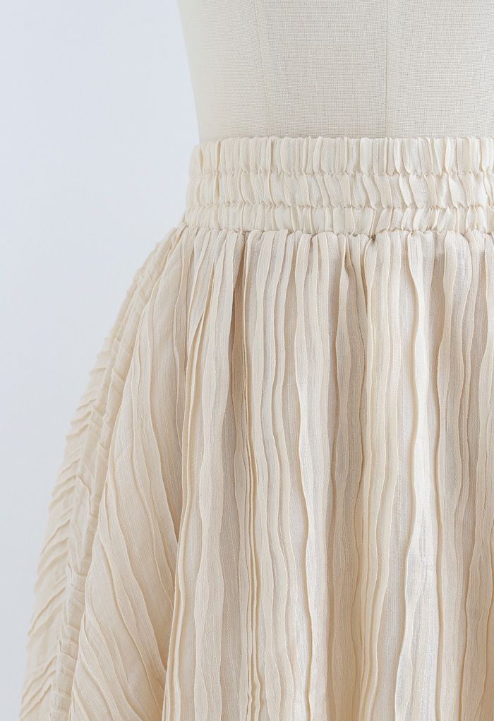 Falda pantalón de doble capa con relieve ondulado en color crema