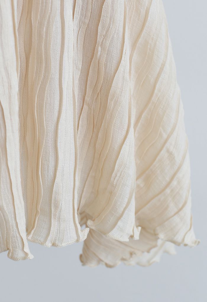 Falda pantalón de doble capa con relieve ondulado en color crema
