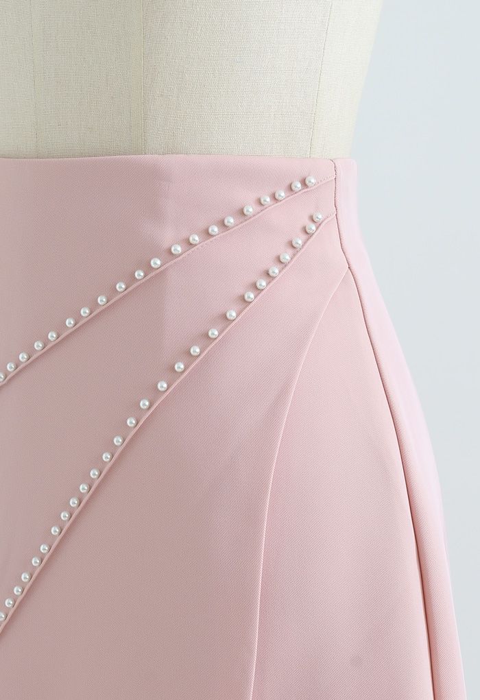 Minifalda con solapa adornada con perlas en rosa