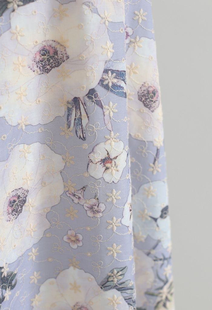 Falda bordada con ojales y estampado de flores frescas