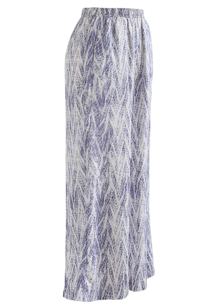 Pantalones de salón de pernera ancha con estampado de serpiente en zigzag en azul