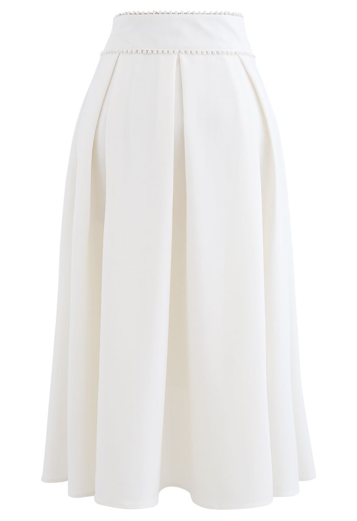 Falda midi plisada con cintura nacarada en blanco