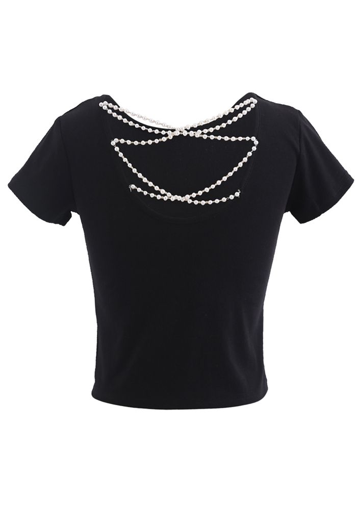 Camiseta corta con cadena de perlas entrecruzadas en negro