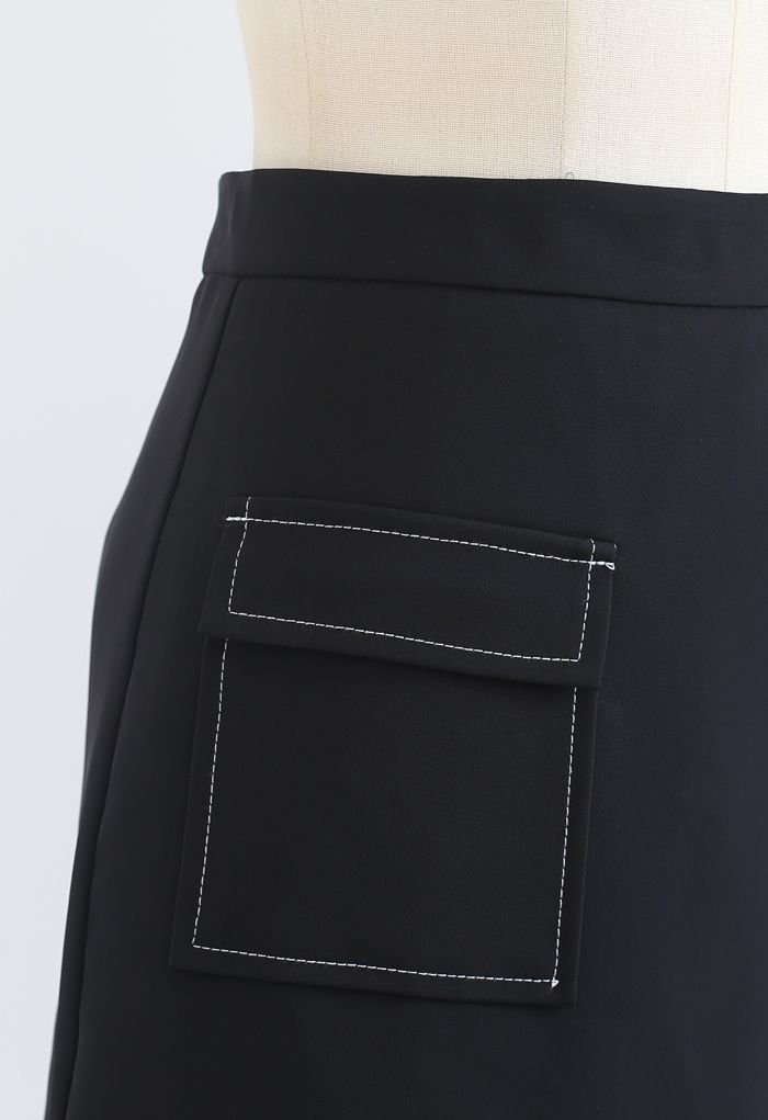 Minifalda con solapa y botones en contraste en negro