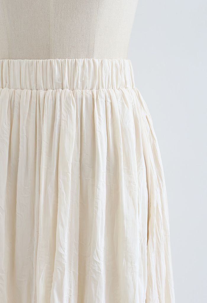 Falda ligera de gasa plisada en color crema