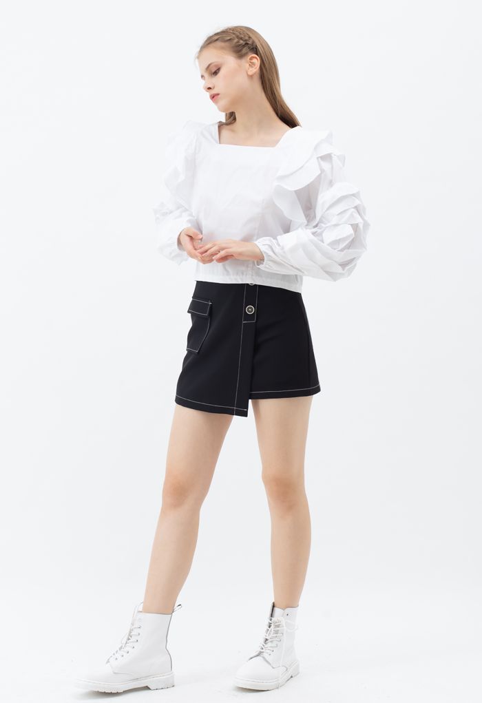 Minifalda con solapa y botones en contraste en negro