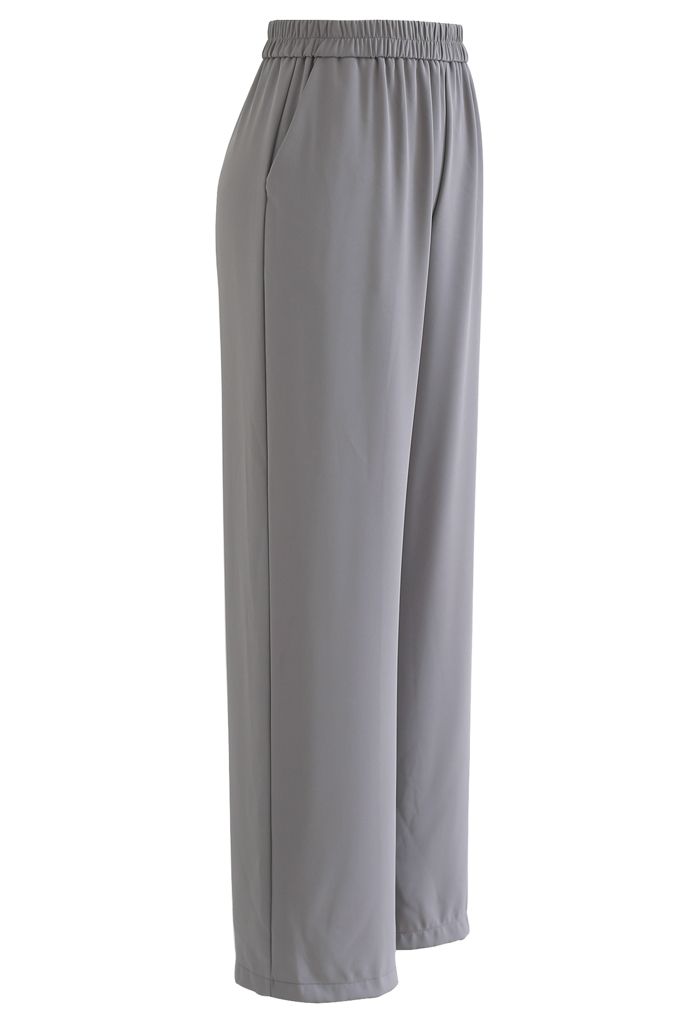 Pantalones rectos con cintura elástica en gris