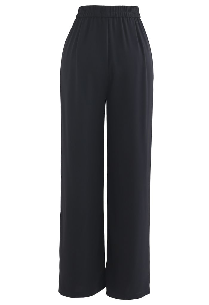 Pantalones rectos con cintura elástica en negro