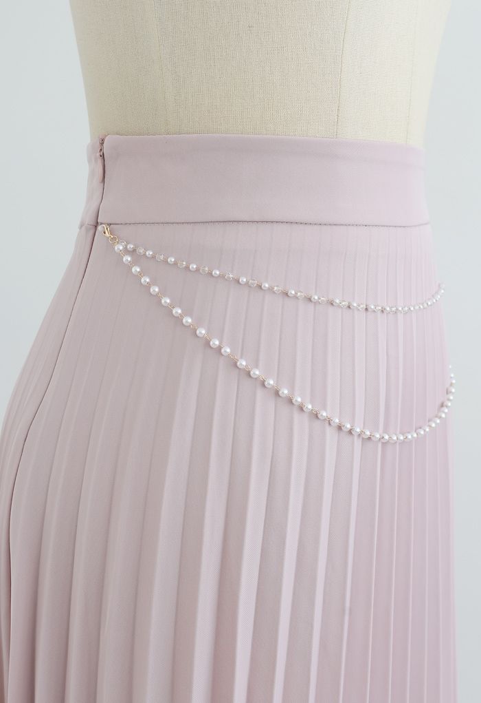 Falda midi plisada con cadena drapeada en rosa