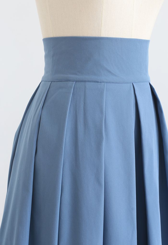 Falda midi de algodón con pliegues en azul
